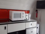 Kitchen with microwave